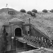 Troops_of_51st_Highland_Division_march_over_a_drawbridge_into_Fort_de_Sainghain_on_the_Maginot_Line,_3_November_1939