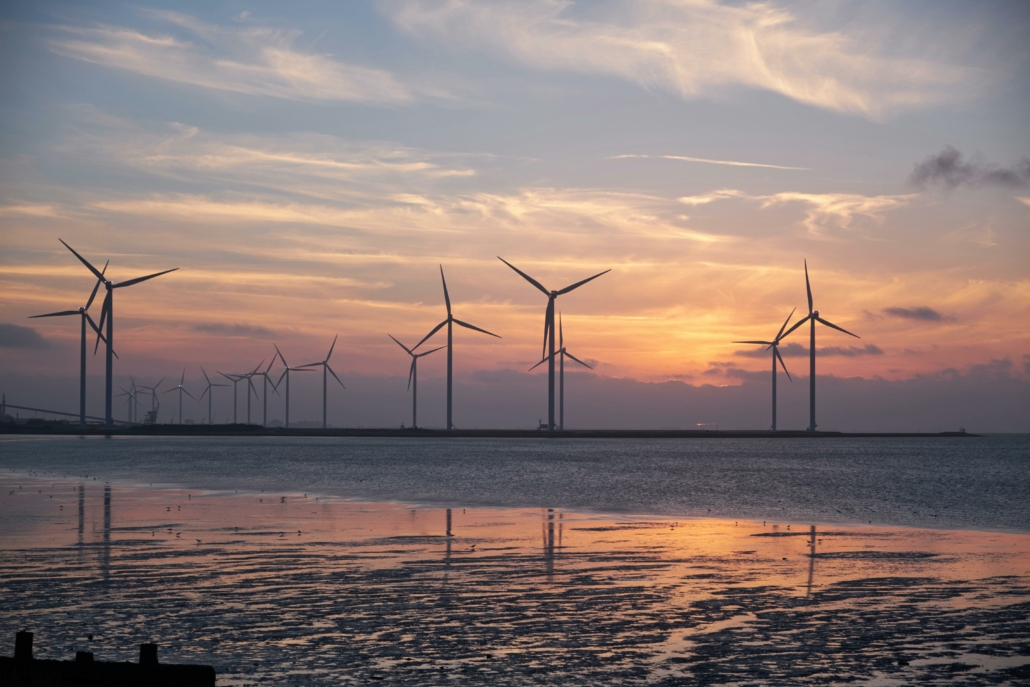 A photo of several electricity-generating windmills. 